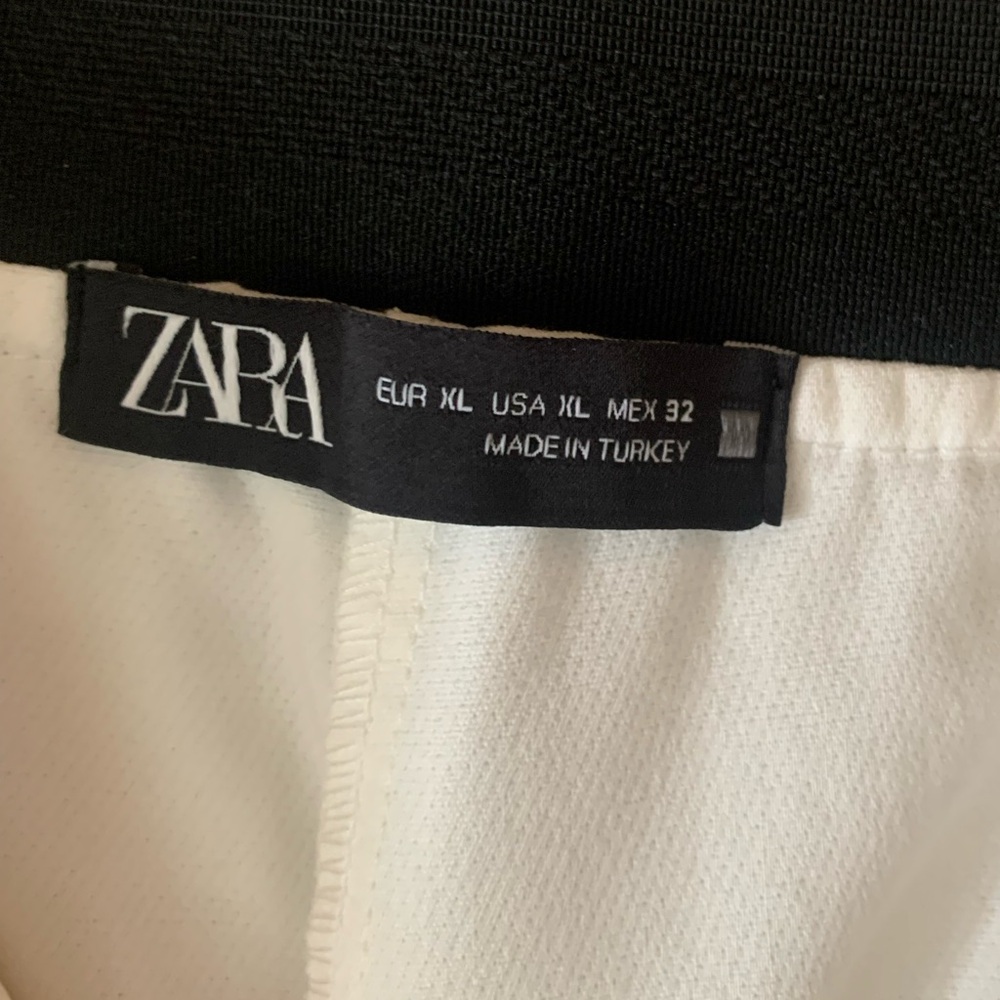 Zara dressed/office pants. New with tag. Never worn. Color white. Size XL